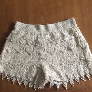 White lace shorts